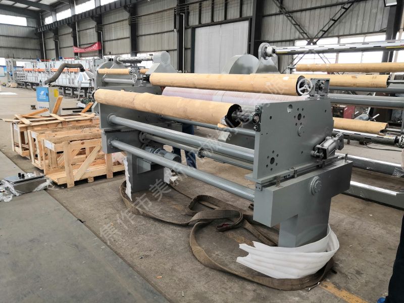 Automatic paper receiving and breaking section